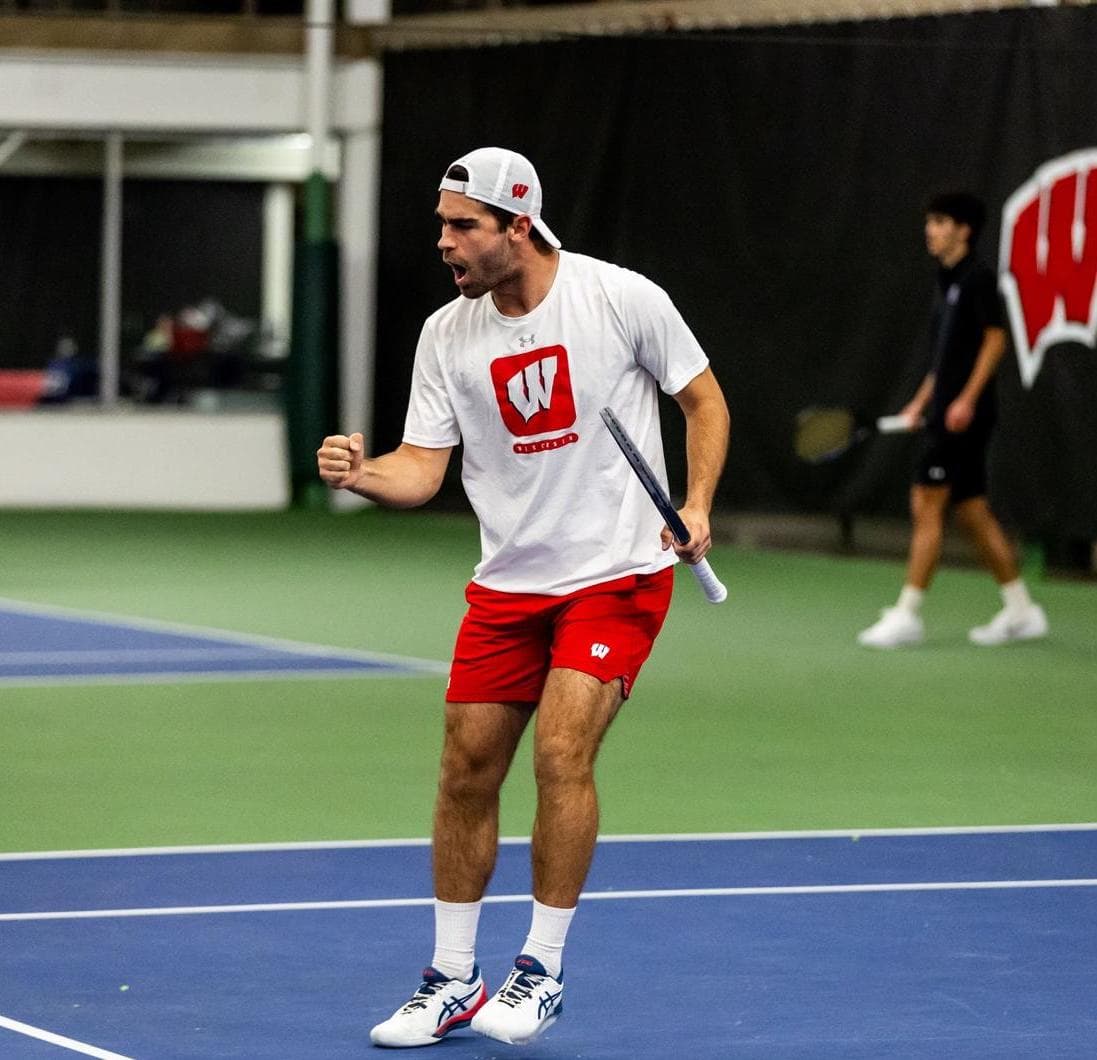 Gabriel Huber celebrating a point during college tennis match A tennis student-athlete from Wisconsin celebrating a point.